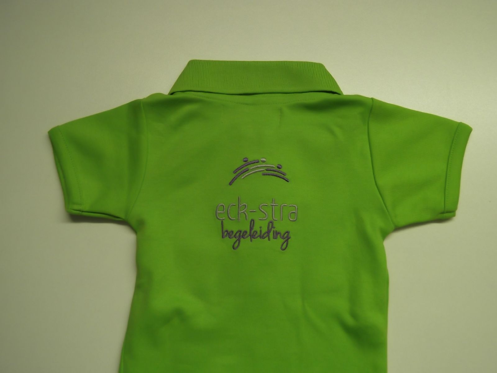 logo op werkbroek